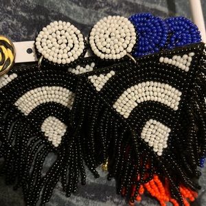 Toschia fringe earrings. Never worn